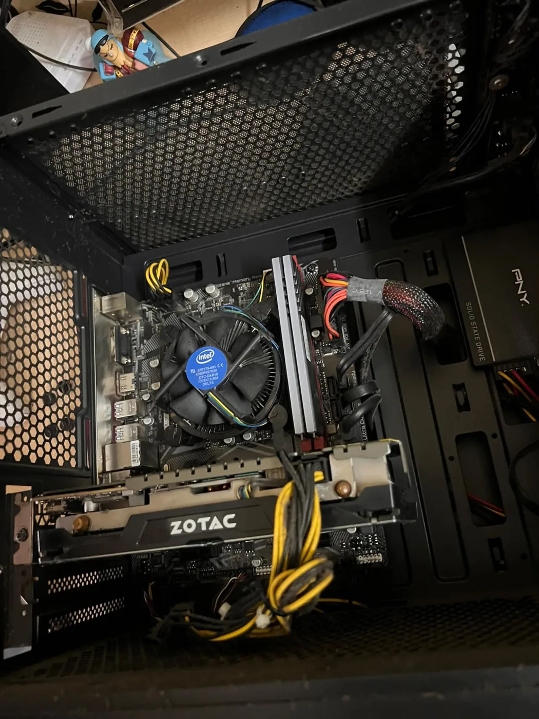 Actual Intel desktop PC with stock CPU cooler following thermal paste replacement