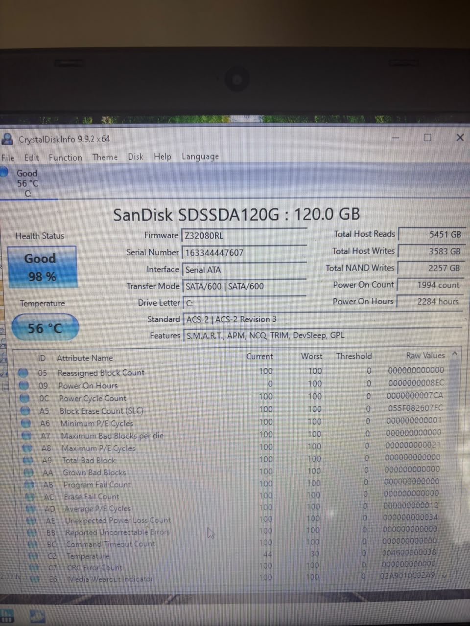 CrystalDiskInfo SSD health check on a Windows computer during a maintenance service